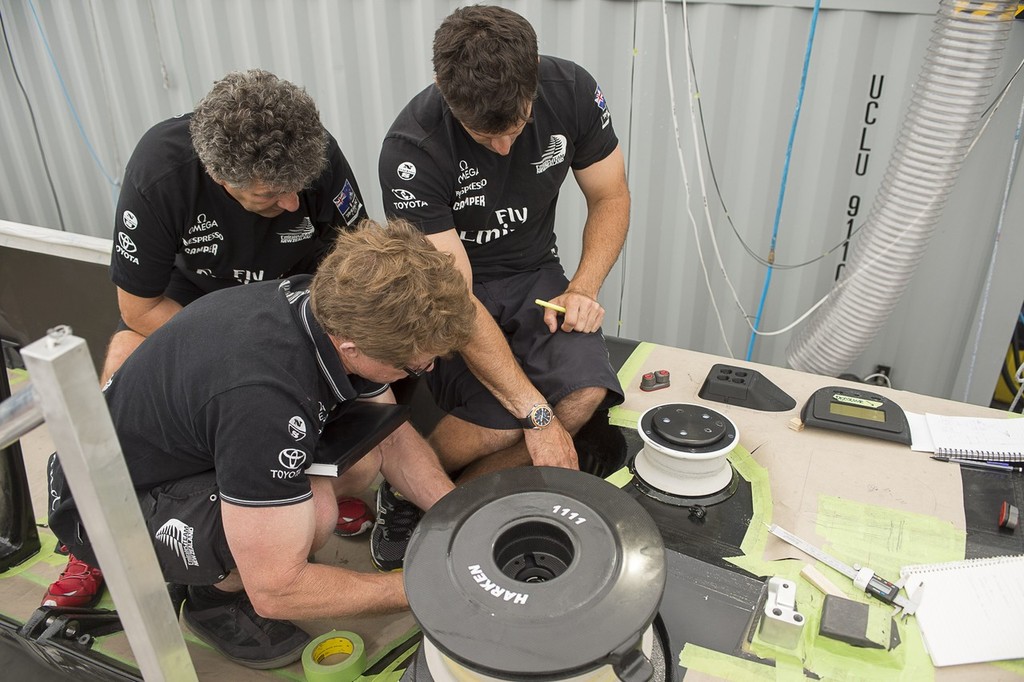 Sean Regan, Giovanni Belgrano and Jeremy Lomas discuss layout in the cockpit of Emirates Team New Zealands second AC72. 18/1/2013 photo copyright Chris Cameron/ETNZ http://www.chriscameron.co.nz taken at  and featuring the  class