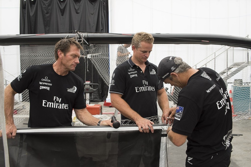 Emirates Team New Zealand, sailors Tony Rae, Winston MacFarlane and Adam Beashel work on the tramp for the teams second AC72. photo copyright Chris Cameron/ETNZ http://www.chriscameron.co.nz taken at  and featuring the  class