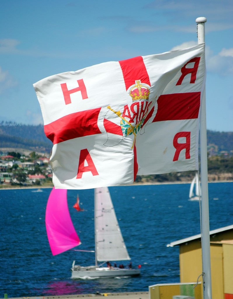 The flag of the Royal Hobart Regatta Association frames Colin Denny&rsquo;s The Protagonist photo copyright Peter Campbell taken at  and featuring the  class