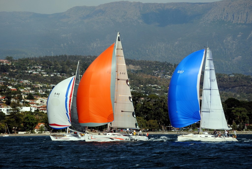 Intrigue, Auch and Pisces racing down the Derwent after the start - Bruny Island Yacht Race 2013 © Peter Campbell
