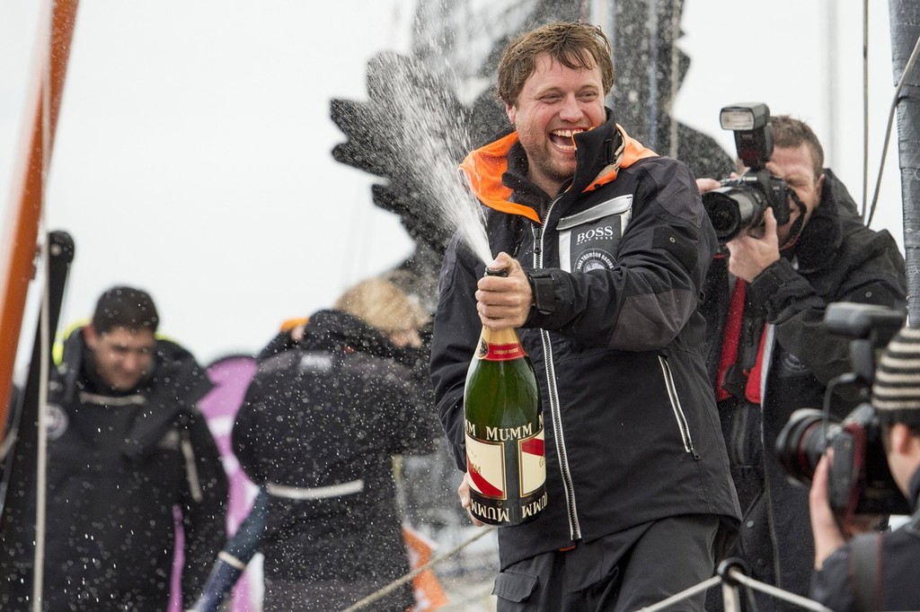 SAILING - VENDEE GLOBE 2012/2013 - LES SABLES D'OLONNE (FRA) - 30/01/13 - PHOTO VINCENT CURUTCHET / DPPI - VENDEE GLOBE FINISH FOR ALEX THOMSON (GBR) / HUGO BOSS AFTER 80D 19H 23MN 43SEC / 3rd FOR PODIUM WITH CHAMPAGNE MUMM photo copyright Vincent Curutchet / DPPI / Vendée Globe  taken at  and featuring the  class