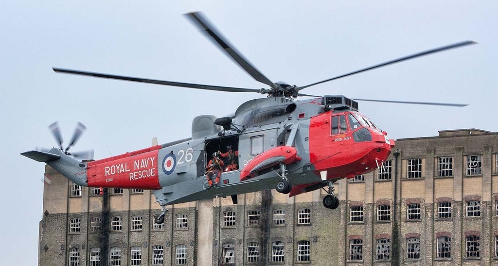 A Royal Navy Seaking does search and rescue demonstrations at the Tullett Prebon London Boat Show, ExCeL, London, as part of the 60th anniversary of S & R. photo copyright onEdition http://www.onEdition.com taken at  and featuring the  class