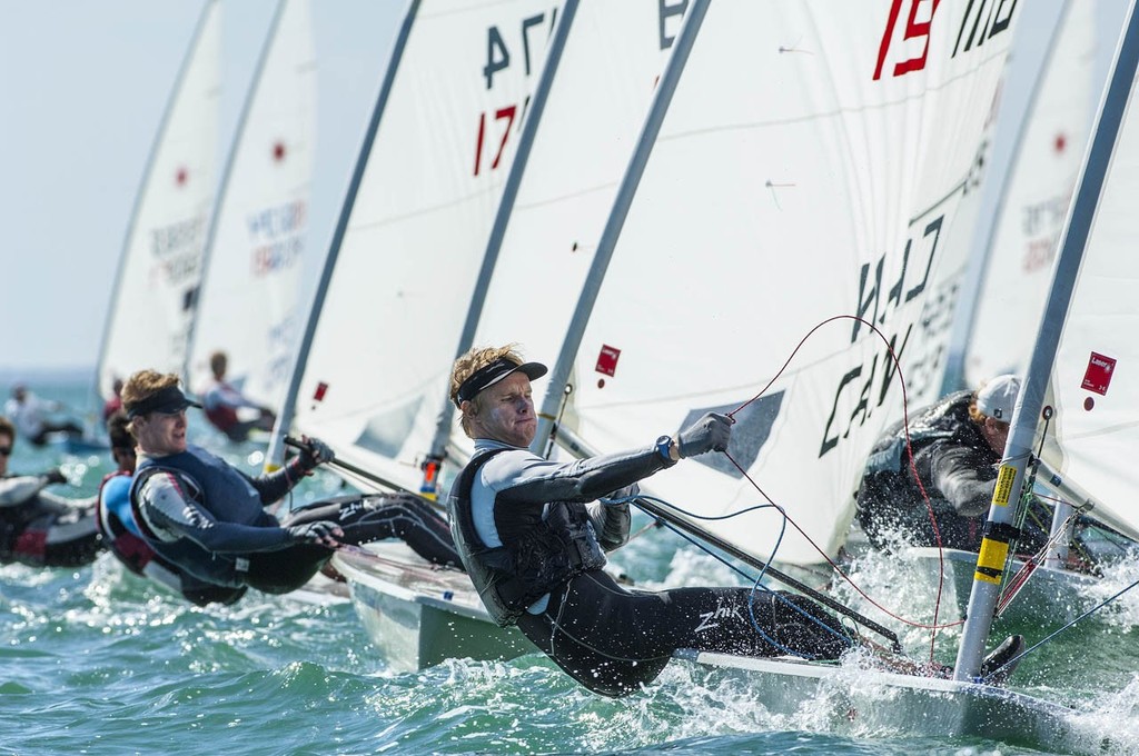 Laser Fleet Rounds the windward mark - ISAF Sailing World Cup Miami 2013 © Walter Cooper http://waltercooperphoto.com/