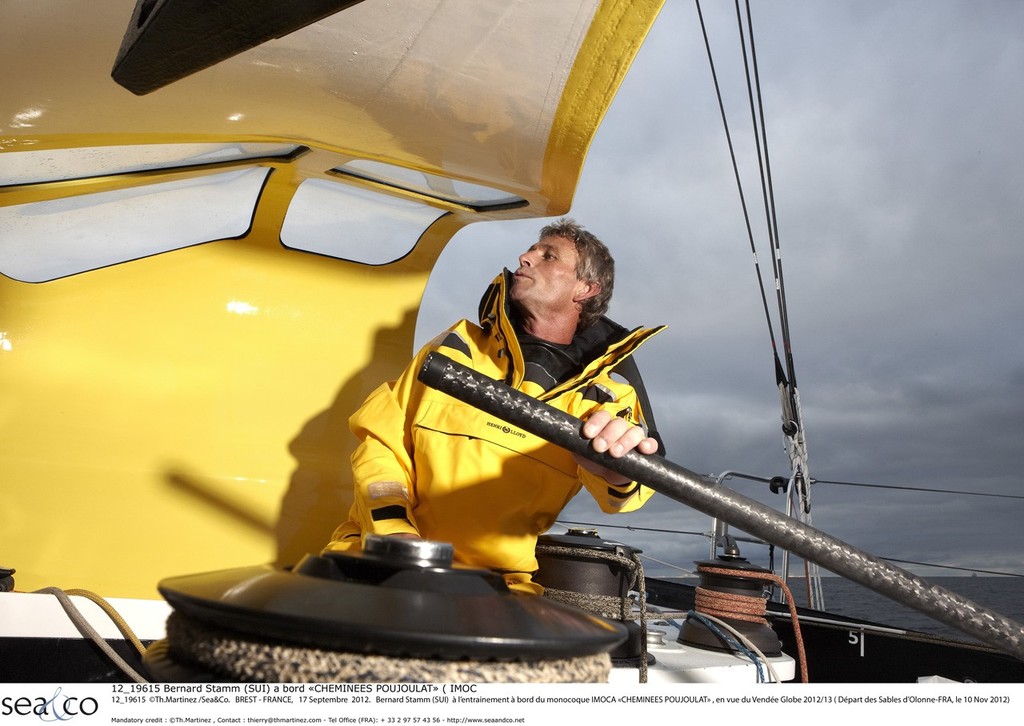 12_19615  ©Th.Martinez /Sea&Co.   BREST - FRANCE,   17 Septembre  2012.   Bernard Stamm (SUI)  à l'entrainement à bord du monocoque IMOCA ``CHEMINEES POUJOULAT`` , en vue du Vendée Globe 2012/13 ( Départ des Sables d'Olonne-FRA, le 10 Nov 2012) photo copyright ThMartinez/Sea&Co http://www.thmartinez.com taken at  and featuring the  class