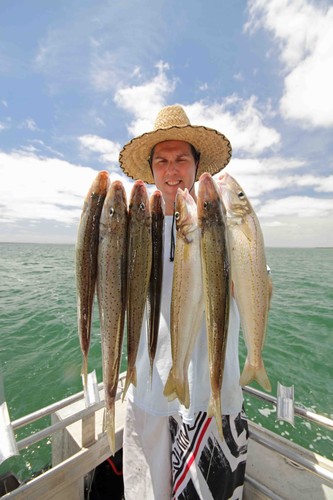 You know you have good fish when your hands are this full. © Jarrod Day