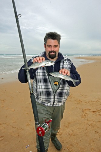 Gary display's two typical Victorian salmon. © Jarrod Day