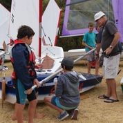 Gisborne sailing legend Rod McCulloch helps the kids rig - Ohope Summer Regatta photo copyright Monique Tarboton taken at  and featuring the  class