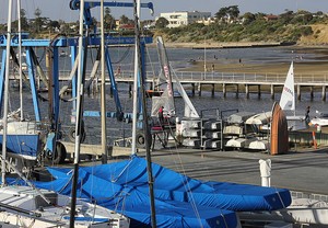 It was not such a good evening for these skiff sailors whose mainsail had been torn. - TP52 Southern Cross Cup photo copyright  John Curnow taken at  and featuring the  class