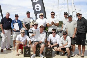 Beau Geste’s crew with the loot. The Coopers 62 Pilsner was put on ice immediately for all to drink. - TP52 Southern Cross Cup photo copyright Teri Dodds http://www.teridodds.com taken at  and featuring the  class