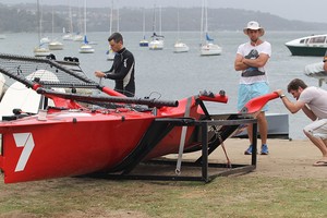 Gotta Love It 7 repairing damage before Sunday&rsquo;s opener of JJ Giltinan Championship 2013 photo copyright Frank Quealey /Australian 18 Footers League http://www.18footers.com.au taken at  and featuring the  class