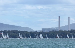 The fleet moves up the western shore of Lake Macquarie. - F18 Nationals photo copyright Crosbie Lorimer http://www.crosbielorimer.com taken at  and featuring the  class