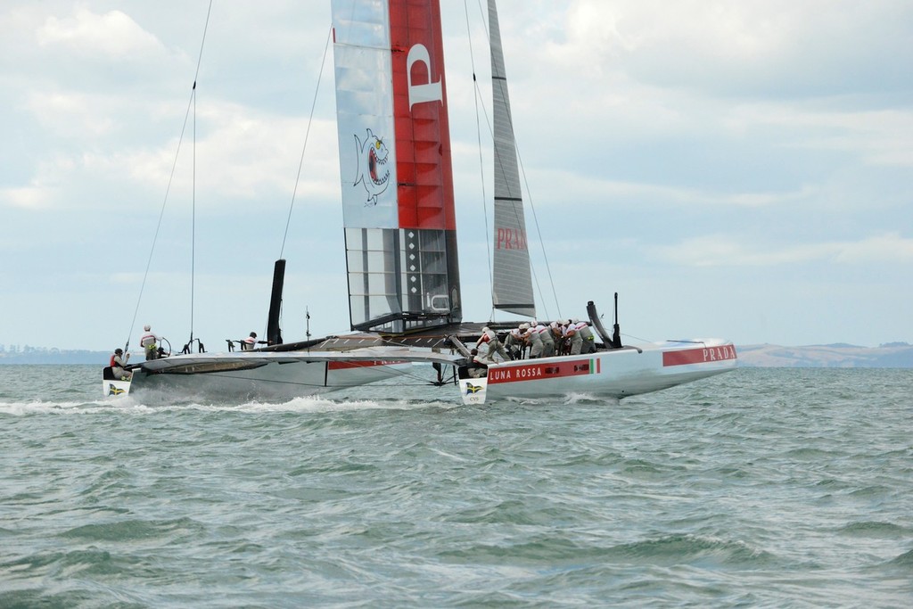 Luna Rossa drops off her foils in the gybe - Emirates Team NZ and Luna Rossa Race Training - March 6, 2013 photo copyright Sail-World.com/NZ  taken at  and featuring the  class