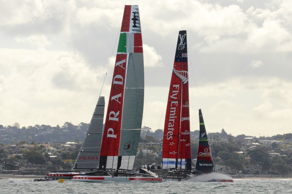 NZA piles on the pace and digs her bow in after rounding the top mark - Emirates Team NZ and Luna Rossa Race Training - March 6, 2013 photo copyright Sail-World.com NZL http://www.sail-world.com/nz taken at  and featuring the  class