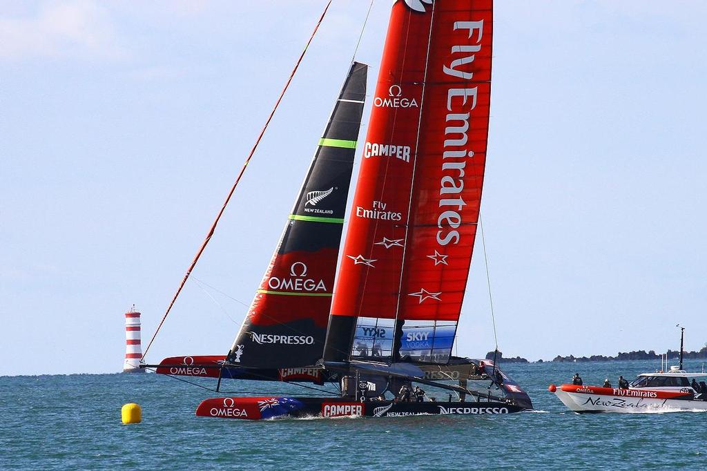 Gennaker furl complete - Emirates Team NZ - March 2013 photo copyright Richard Gladwell www.photosport.co.nz taken at  and featuring the  class