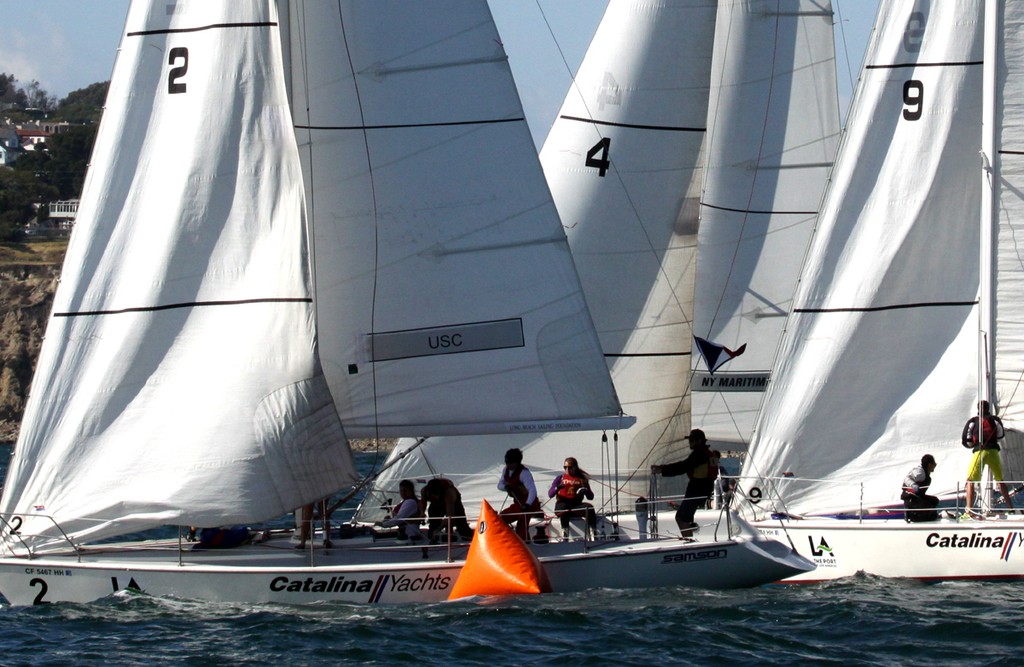 2013 Port of Los Angeles Harbor Cup - USC (I.) gets stuck on windward mark; Trojans did a penalty turn photo copyright Rich Roberts / photo boat captain Mike Learned . taken at  and featuring the  class