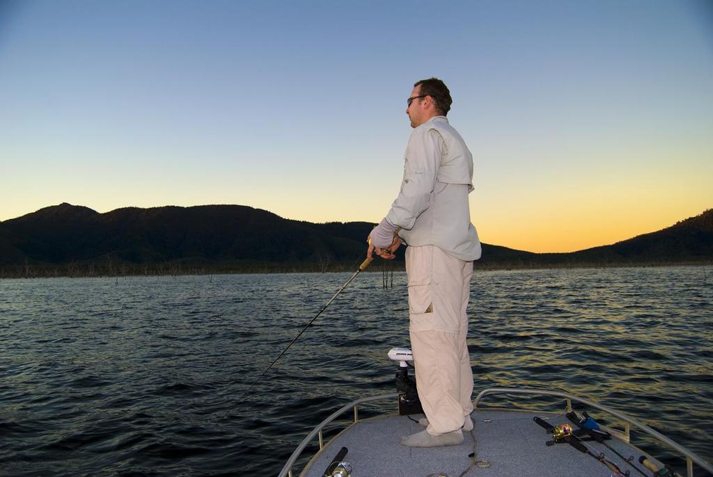 Impoundment specialist Jason Crofts working a point in Peter Faust Dam.  Jason loves to find a prominent point and stay there from dusk until well after dark. photo copyright Lee Brake taken at  and featuring the  class