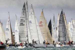 Race photographer Paul Wyeth's image from 2012 clearly illustrates the requirement for skippers to keep their wits about them on the Start Line - Round the Island Race 2013 photo copyright Paul Wyeth / www.pwpictures.com http://www.pwpictures.com taken at  and featuring the  class