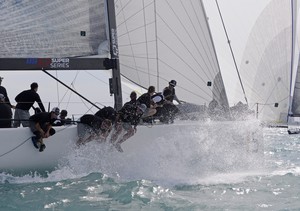 Miami March 9 2013 Gaastra TP52 World Championships, final day, flying down-wind photo copyright  Rick Tomlinson http://www.rick-tomlinson.com taken at  and featuring the  class