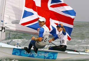 QINGDAO, CHINA - AUGUST 18:  Nick Rogers (R) and Joe Glanfield (L) of Great Britain celebrate finishing second placed overall following the Men's 470 class medal race held at the Qingdao Olympic Sailing Center during day 10 of the Beijing 2008 Olympic Games on August 18, 2008 in Qingdao, China.  (Photo by Clive Mason/Getty Images) photo copyright  Clive Mason taken at  and featuring the  class