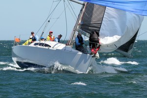 Lots of action for Wind Speed with getting the headsail down. photo copyright  Alex McKinnon Photography http://www.alexmckinnonphotography.com taken at  and featuring the  class