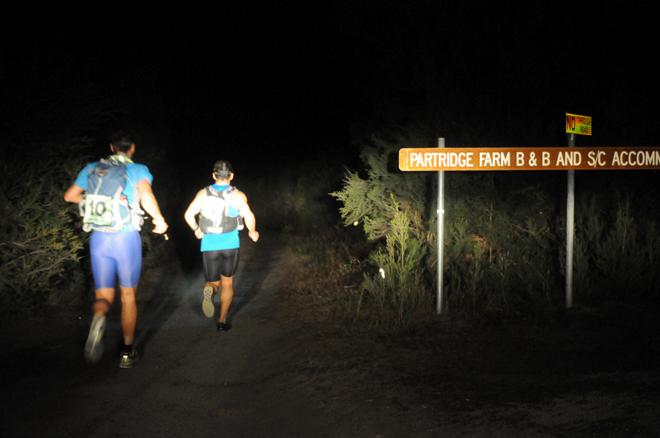 Euphoria Furniture runners, John Cannell and Chris Turnbull heading for Mount Strzelecki on Flinders Island - 2013 Three Peaks Race © Paul Scrambler