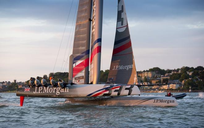 Sir Ben Ainslie on his way to breaking the Round the Island Record by over 15 minutes (2hrs 52 mins 15 secs) onboard J.P. Morgan BAR AC45. The win was dedicated to the memory of his friend Andrew ’Bart’ Simpson, who died in a sailing accident recently. A black ribbon with ’Bart’ in the middle were worn by the crew in his memory. © onEdition http://www.onEdition.com