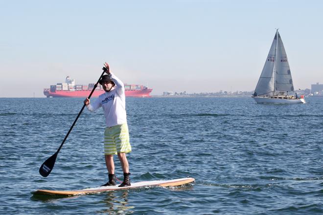 Everyone came out to watch the NMWS, including this Stand up Paddleboarder. - Nautilus Marine Winter Series ©  Alex McKinnon Photography http://www.alexmckinnonphotography.com