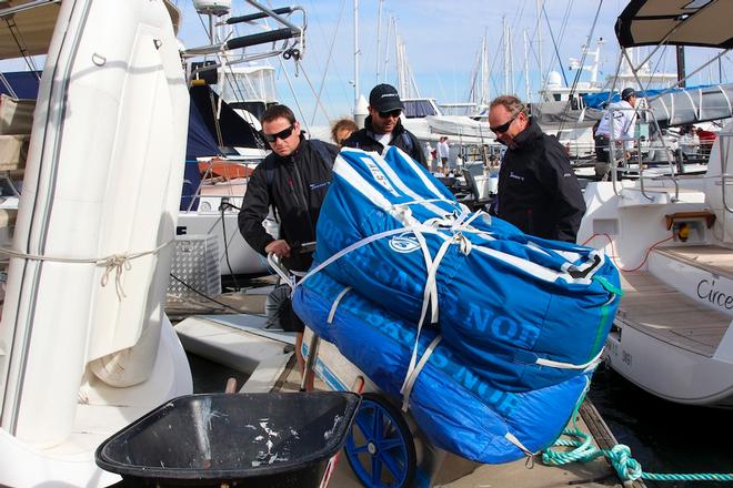 Sail repairs on Shogun - TP52 Southern Cross Cup - Round Two © Teri Dodds http://www.teridodds.com