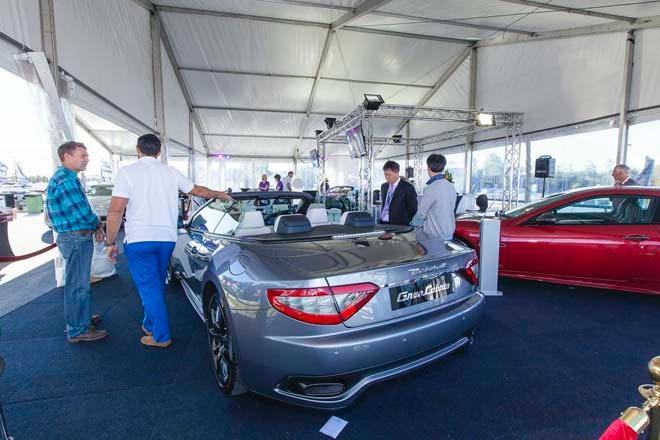 Checking out the Maserati - 2013 Sanctuary Cove International Boat Show Day 1 © Mark Burgin