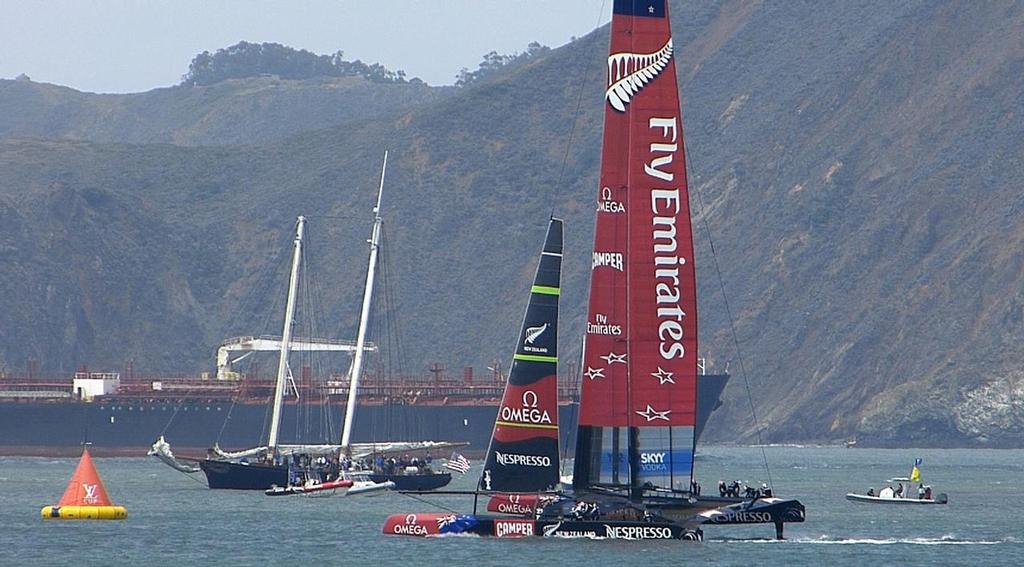 With the replica of the schooner America in the background - 2013 Louis Vuitton Cup, Round Robin 1, Race 1 photo copyright John Navas  taken at  and featuring the  class