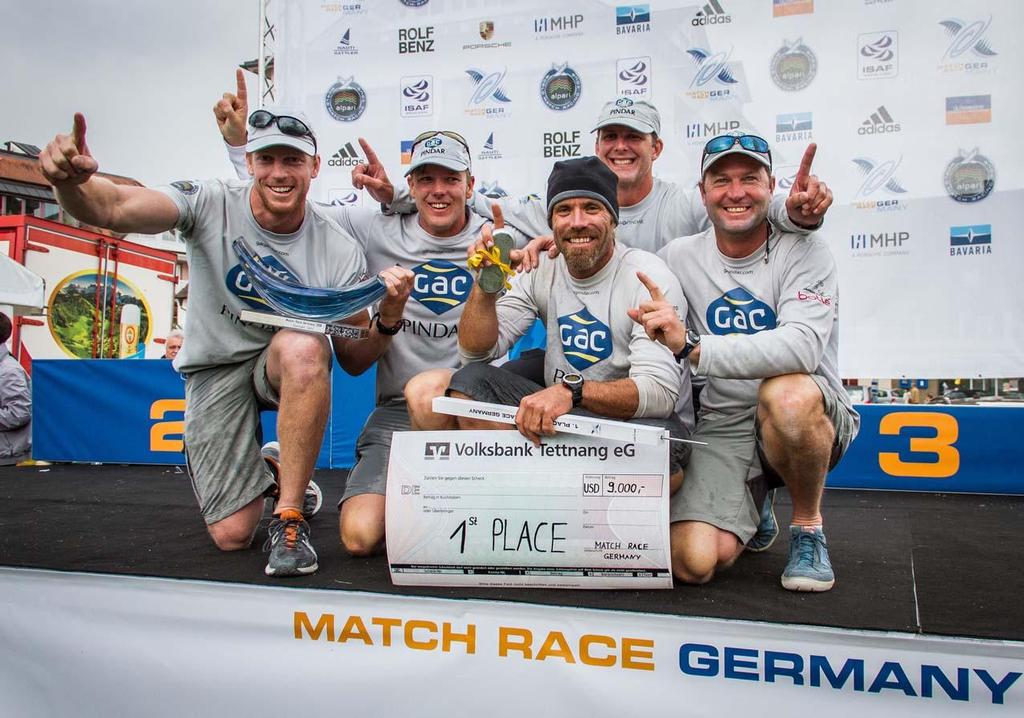 Willams and crew on the podium at Match Race Germany 2013 © Brian Carlin
