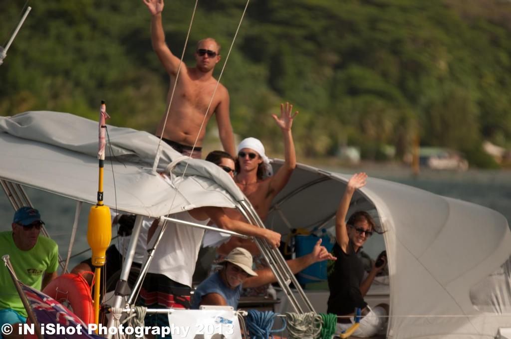 Happy crew of Charm Offensive, Nick Black, en route Germany to Australia with a sojourn at TPR - Tahiti Pearl Regatta 10th Edition - Photography from iN iShot photo copyright Morgan Rogers taken at  and featuring the  class