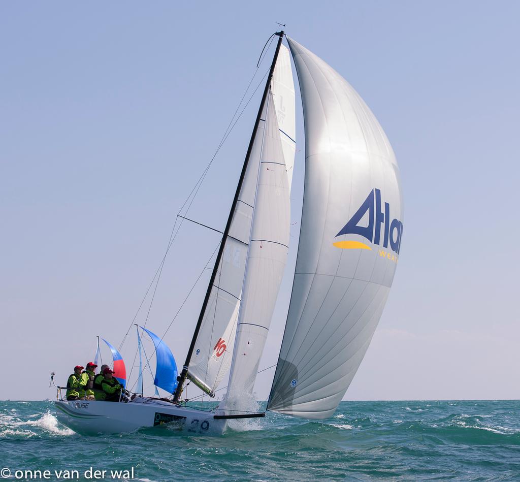 J/70s sailing fast downwind - Charleston Race Week photo copyright Onne Vanderwal taken at  and featuring the  class