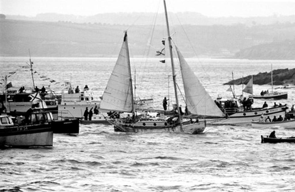 Circa 22nd April 1969: Robin Knox-Johnston waving aboard his 32ft yacht SUHAILI off Falmouth, England after becoming the first man to sail solo non-stop around the globe. Knox-Johnston was the sole finisher in the Sunday Times Golden Globe solo round the world race, having set out from Falmouth, England on 14th June 1968 © Bill Rowntree - PPL http://www.pplmedia.com