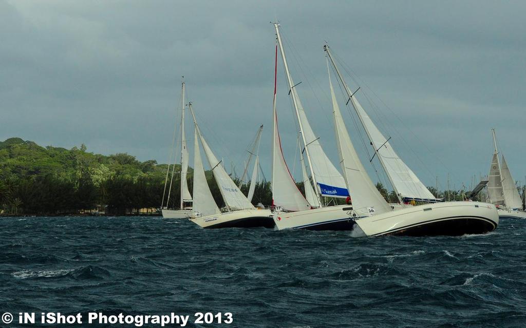 Mono Hull Division 2 gain way at the line in the start Raiatea to Huahine transit race - Tahiti Pearl Regatta 10th Edition - Photography from iN iShot © Morgan Rogers