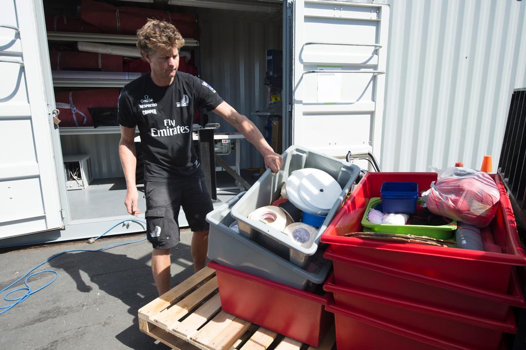 Emirates Team New Zealand sailmaker Richard Kiff loads the sail loft equipment into a container. 5/4/2013 © Chris Cameron/ETNZ http://www.chriscameron.co.nz