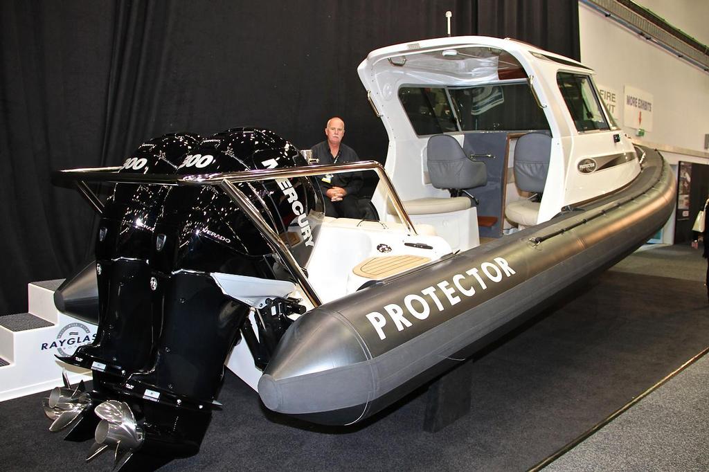 Protector&rsquo;s Lyndsay Turner takes a break aboard a Protector at the Hutchwilco New Zealand Boat Show, May 2013 photo copyright Richard Gladwell www.photosport.co.nz taken at  and featuring the  class