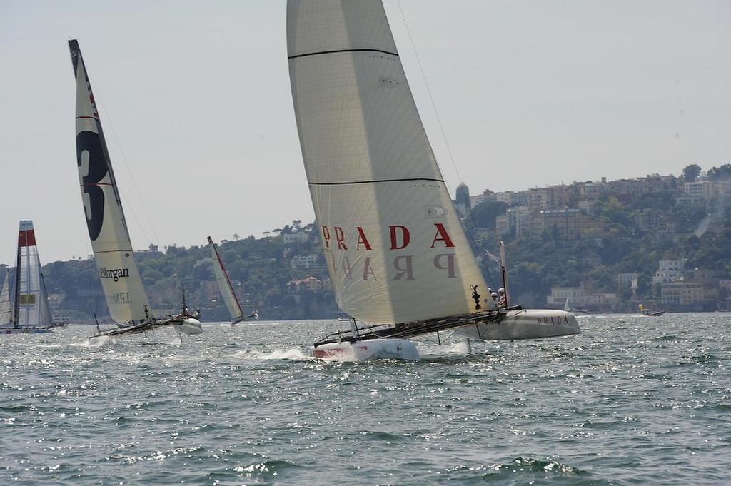 Chris Draper skipper for Luna Rosa is coming off the start in a first place position at speeds of more than 25 knots toward the leeward gate at the ACWS official practice race on the Bay of Napoli in Italy.  ©  SW