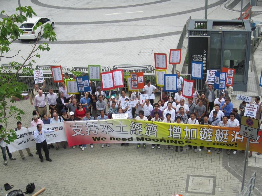 Mr Kandy Chan (Southern District Ship Builders Association), Paul Zimmerman (Designing Hong Kong), Hong Kong Marine Industry Association, and boat owners, crew and staff delivering a petition demanding safe moorings to the Transport Bureau. © Designing Hong Kong