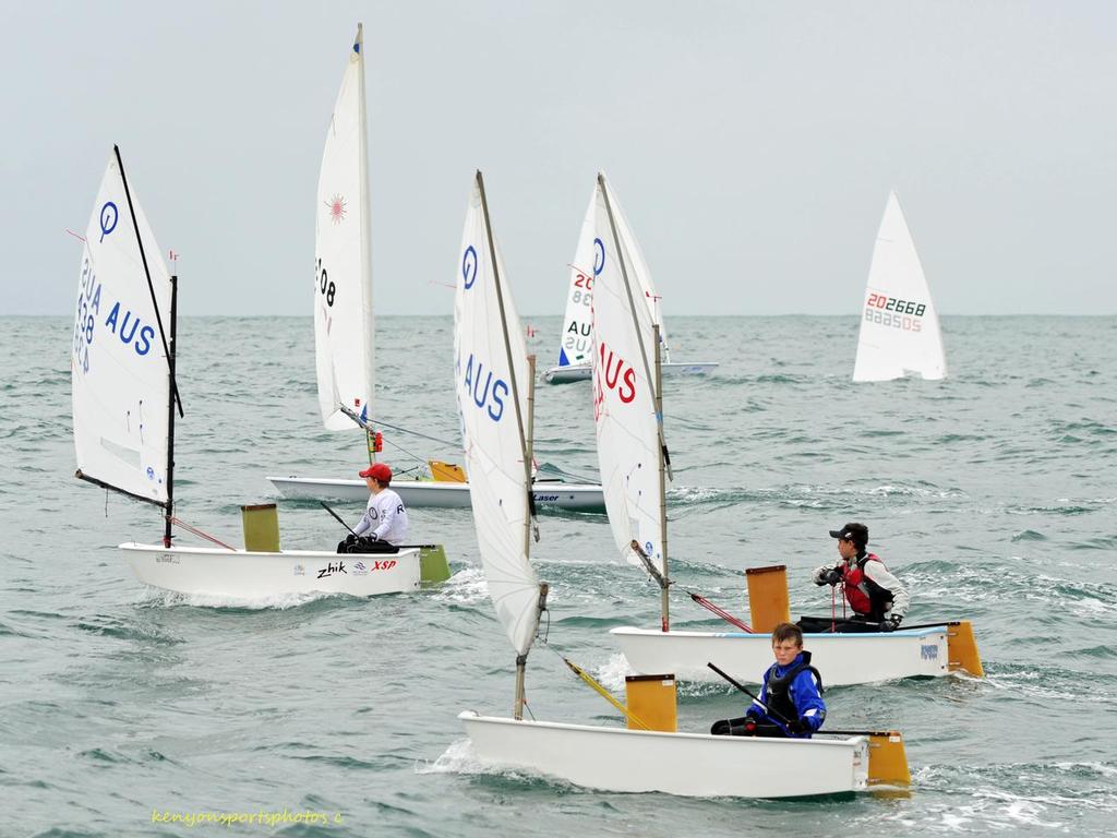 The Optimist Gold Fleet handled the cold and ocean swell to complete four races. - Sail Mooloolaba 2013 photo copyright Mike Kenyon http://kenyonsportsphotos.com.au/ taken at  and featuring the  class