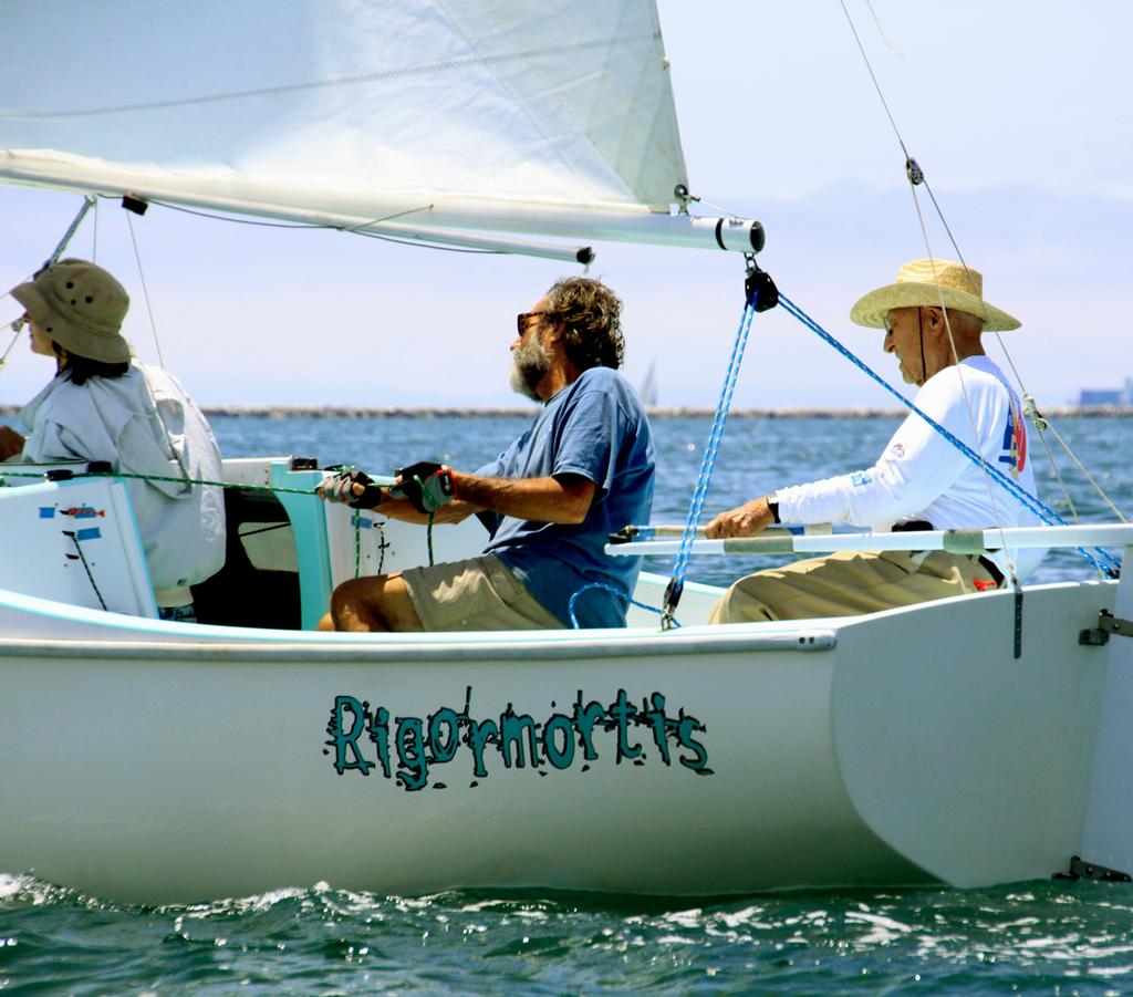 Barney Flam, 89, at the helm with daughter Faye and Dave Myers   © Rich Roberts