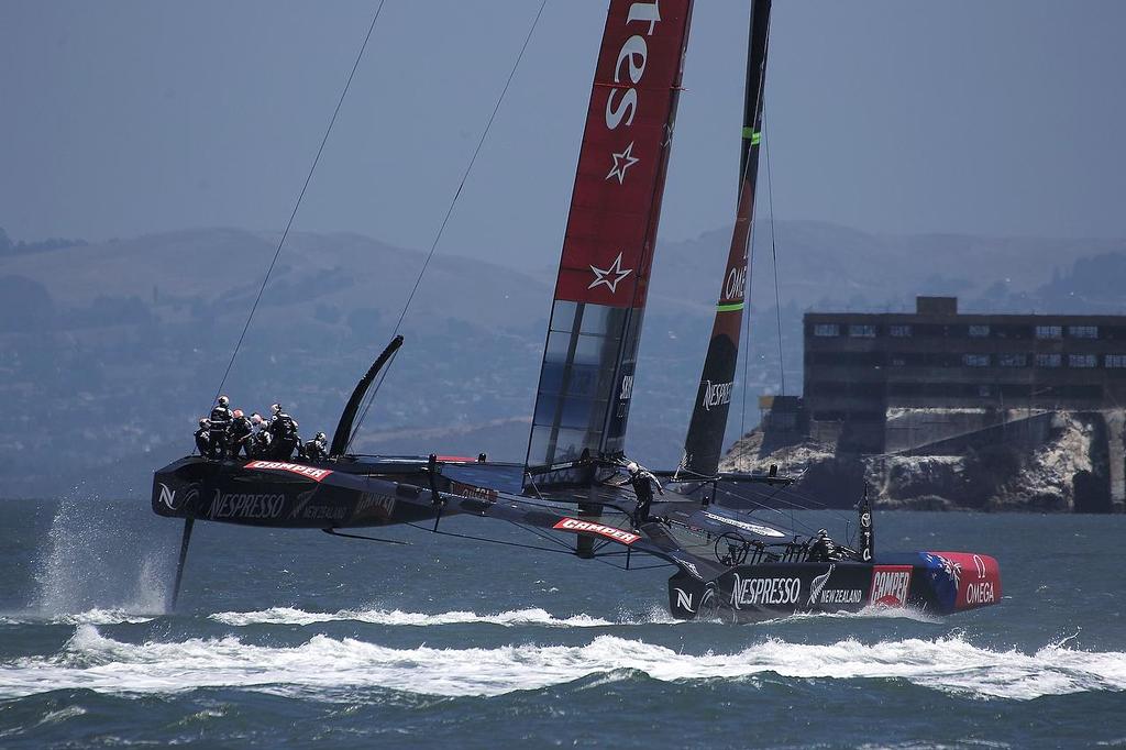 ETNZ races downwind with Alcatraz in the background - 2013 Louis Vuitton Cup, Round Robin 1, Race 1 © Chuck Lantz http://www.ChuckLantz.com