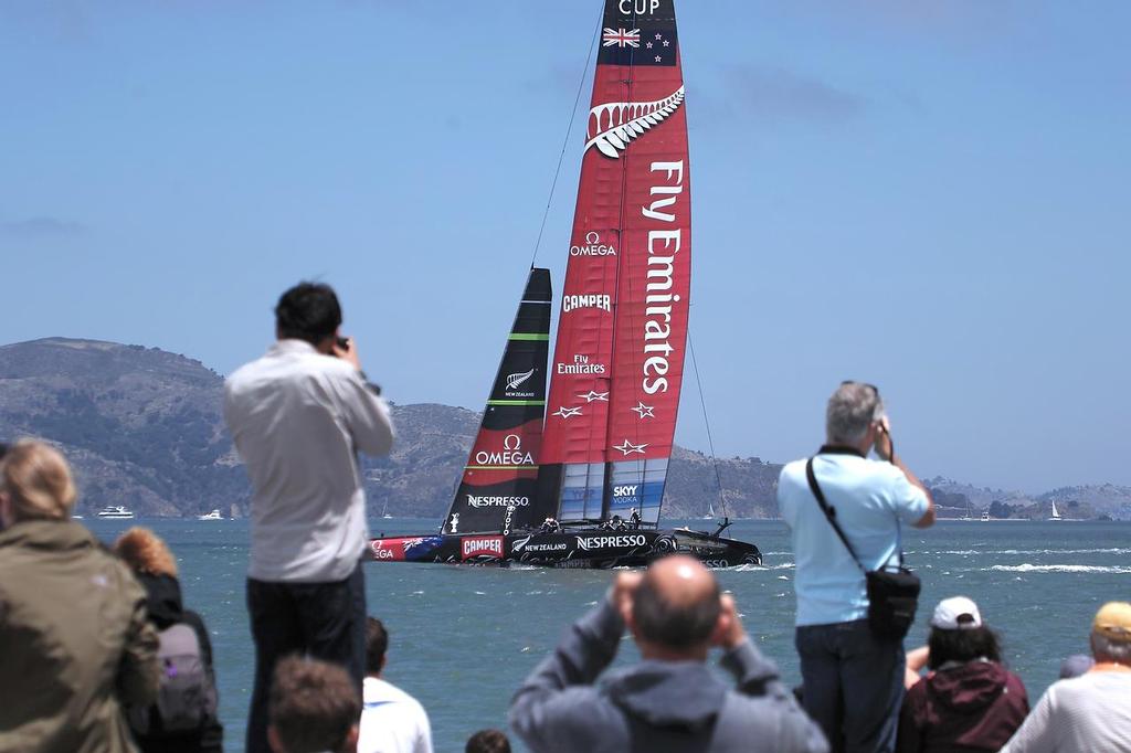 Shore-side spectators get their first look at an AC72 doing battle ... sort of - 2013 Louis Vuitton Cup, Round Robin 1, Race 1 photo copyright Chuck Lantz http://www.ChuckLantz.com taken at  and featuring the  class