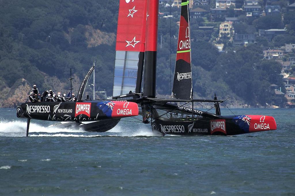 ETNZ reaches downwind, on the verge of getting up on its foils - 2013 Louis Vuitton Cup, Round Robin 1, Race 1 © Chuck Lantz http://www.ChuckLantz.com