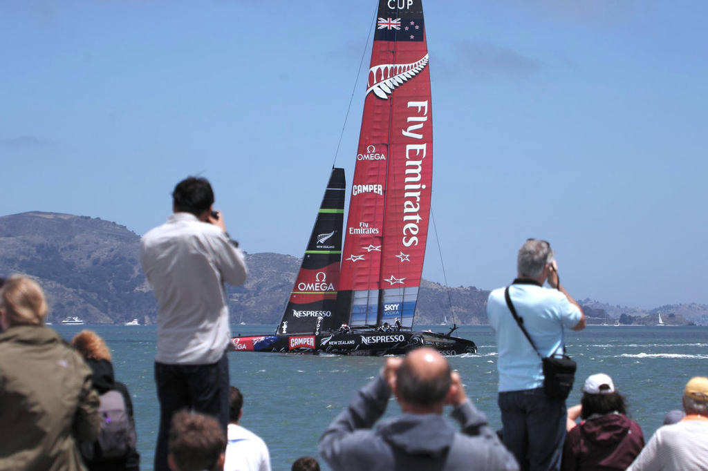 Shore-side spectator get their first look at an AC72 doing battle. More or less. - America’s Cup 2013 - LVC race 1 © Chuck Lantz http://www.ChuckLantz.com