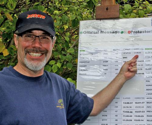 Bill Gibbs indicates corrected time  for his catamaran Afterburner that won the top President of USA Trophy and a 2-year Lexus IS F Sport lease  - 2013 Newport to Ensenada Yacht Race © Rich Roberts http://www.UnderTheSunPhotos.com