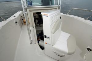 The front od the centre console has plenty of stowage and provisions for a porta pottie. photo copyright Jarrod Day taken at  and featuring the  class
