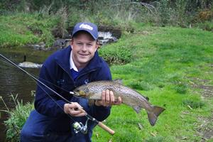 Even dad's can get in on the action at trout farms...... photo copyright Jarrod Day taken at  and featuring the  class