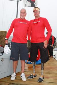 Andrew Fisher (left), skipper, and Brad Kendell, crew, of Bandit photo copyright  www.photoboat.com taken at  and featuring the  class