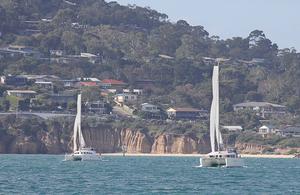 Nandoq and SKI finally get away in the start of the ‘race’. - 2013 Lagoon Escapade photo copyright  John Curnow taken at  and featuring the  class